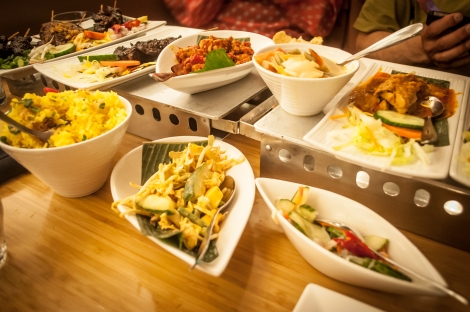 Just some of the dishes of the Rijsttafel (Rice Table in English)